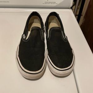 Vans black slip ons . Only worn twice. Size 7 true to size.